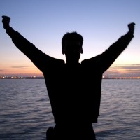 silhouette of person stretching